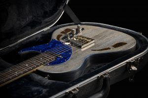 An image showing a custom built guitar in it's storage case